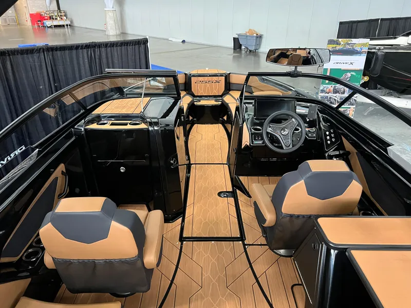 Slide: The Image of 2025 Yamaha Boats 255XD interior with sleek design and modern dashboard. - 8