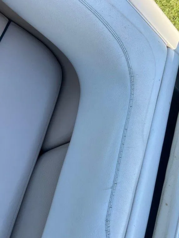 Slide: The Image of Close-up of 1999 Malibu Sunsetter VLX boat seat upholstery. - 11