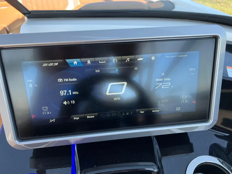 Slide: The Image of Touchscreen display of 2025 Yamaha Boats 252SD showing speed, radio, and water temperature. - 16