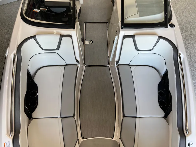 Slide: The Image of 2025 Yamaha Boats AR250 interior with sleek gray seating and modern design. - 11