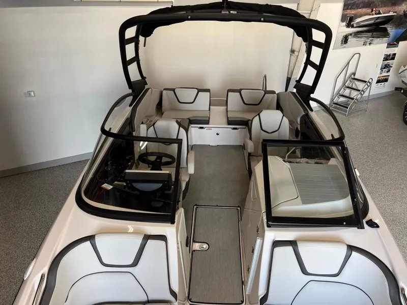 Slide: The Image of 2025 Yamaha Boats AR250 interior with sleek seating and modern design. - 12