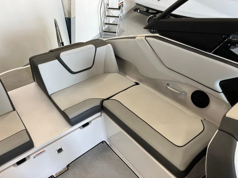 Slide: The Image of 2025 Yamaha AR250 boat interior with sleek, modern seating design. - 15