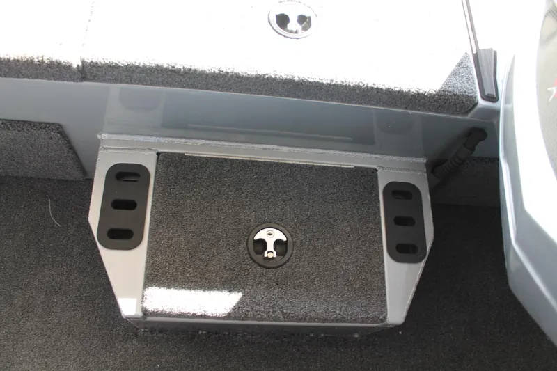 Slide: The Image of 2025 Vexus AVX1880 boat interior storage compartment with carpeted finish. - 18