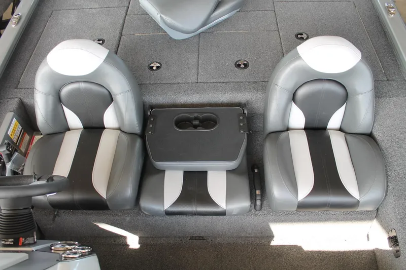 Slide: The Image of 2025 Vexus AVX1880 boat interior with two seats and center console. - 19