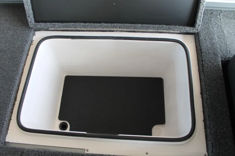 Slide: The Image of Vexus AVX1880 2025 boat storage compartment with black interior lining. - 22
