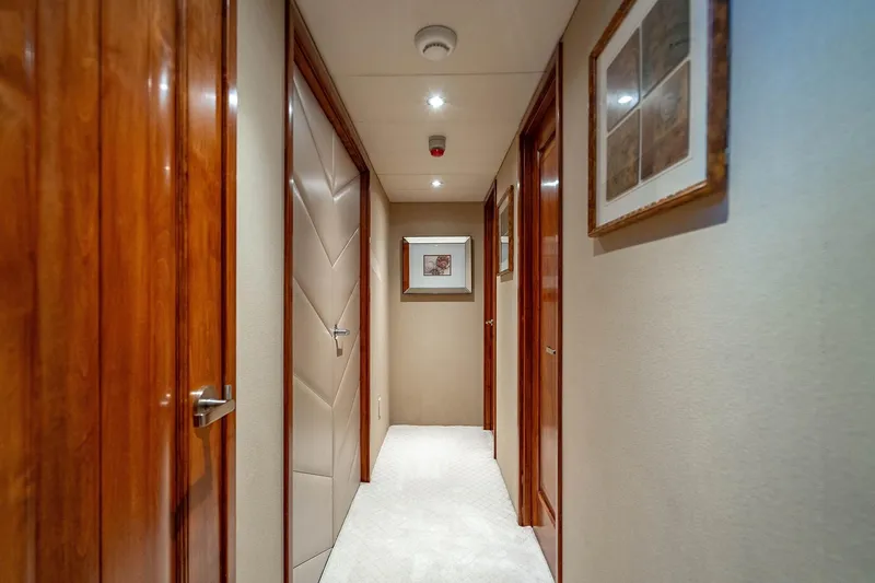 Slide: The Image of Luxurious hallway inside 2009 Custom Crystal Motoryacht with elegant wood finishes and artwork. - 120