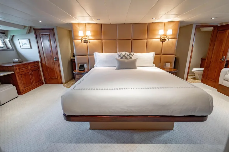 Slide: The Image of Luxurious bedroom interior on 2009 Custom Crystal Motoryacht with elegant wood accents. - 123