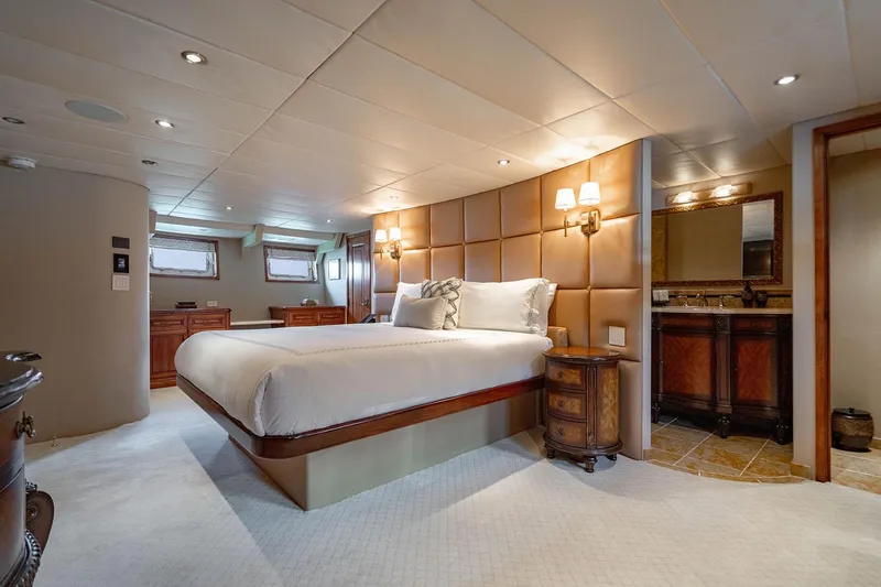 Slide: The Image of Luxurious bedroom interior on 2009 Custom Crystal Motoryacht with elegant furnishings and ambient lighting. - 127