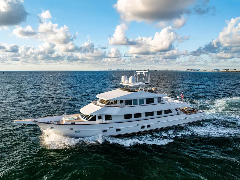 Slide: The Image of Luxurious Custom Crystal Motoryacht 2009 cruising on open sea at sunset. - 14