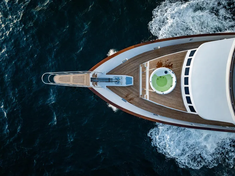 Slide: The Image of Aerial view of a 2009 Custom Crystal Motoryacht on the ocean. - 17