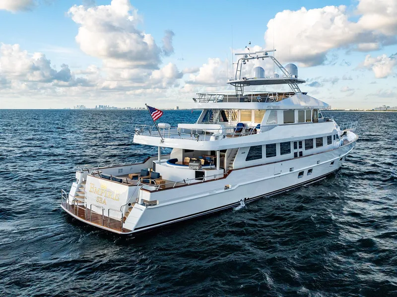 Slide: The Image of Luxurious Custom Crystal Motoryacht 2009 on open sea under sunny skies. - 2