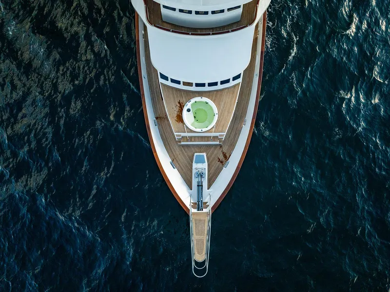Slide: The Image of Aerial view of a 2009 Custom Crystal Motoryacht on the ocean. - 24