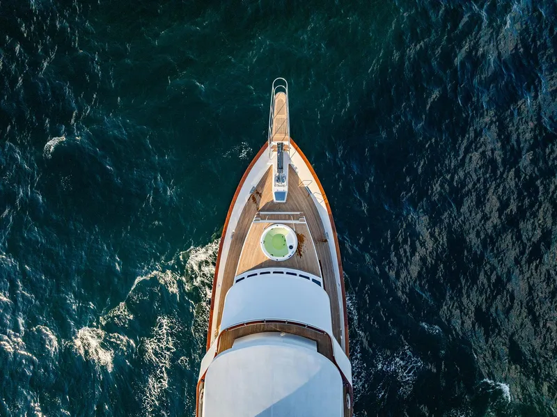 Slide: The Image of Aerial view of a 2009 Custom Crystal Motoryacht on open sea. - 26