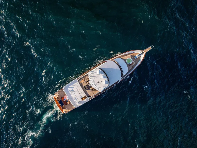 Slide: The Image of Aerial view of a 2009 Custom Crystal Motoryacht on open sea. - 28