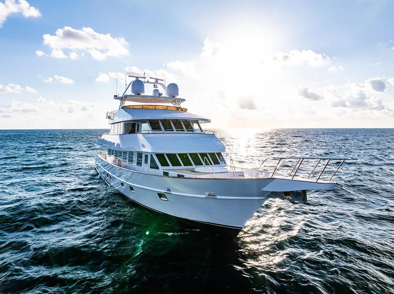 Slide: The Image of Luxurious Custom Crystal Motoryacht 2009 on open sea at sunset. - 3