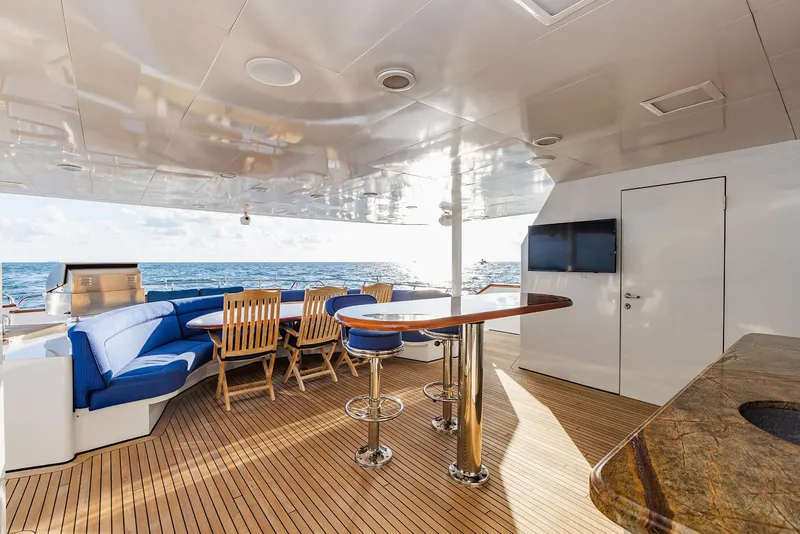 Slide: The Image of Luxurious deck of 2009 Crystal Motoryacht with seating area and ocean view. - 31