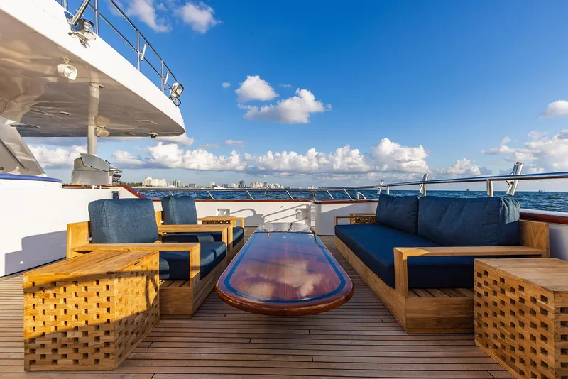 Slide: The Image of Luxurious deck of Custom Crystal Motoryacht 2009 with wooden furniture and ocean view. - 34