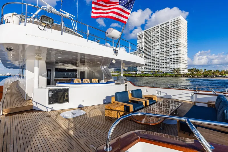 Slide: The Image of Luxurious 2009 Custom Crystal Motoryacht with spacious deck and American flag. - 43