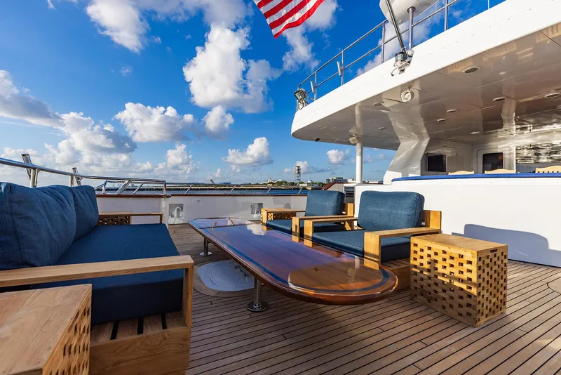 Slide: The Image of Luxurious deck of 2009 Crystal Motoryacht with blue seating. - 45