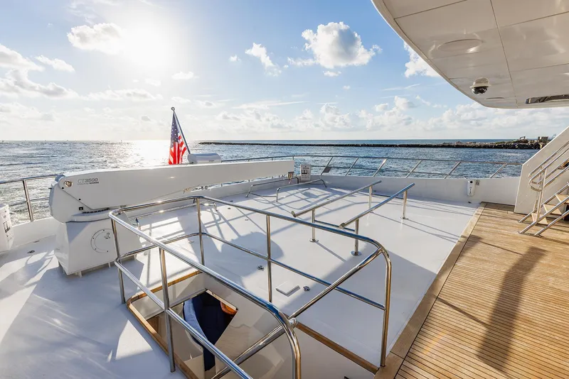 Slide: The Image of Deck of a 2009 Custom Crystal Motoryacht at sunset on the sea. - 47