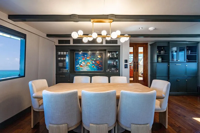 Slide: The Image of Luxurious dining area on 2009 Custom Crystal Motoryacht with elegant decor and ocean view. - 87