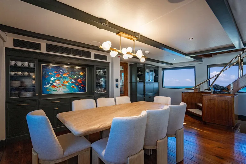 Slide: The Image of Luxurious dining area on 2009 Custom Crystal Motoryacht with elegant decor and ocean views. - 88