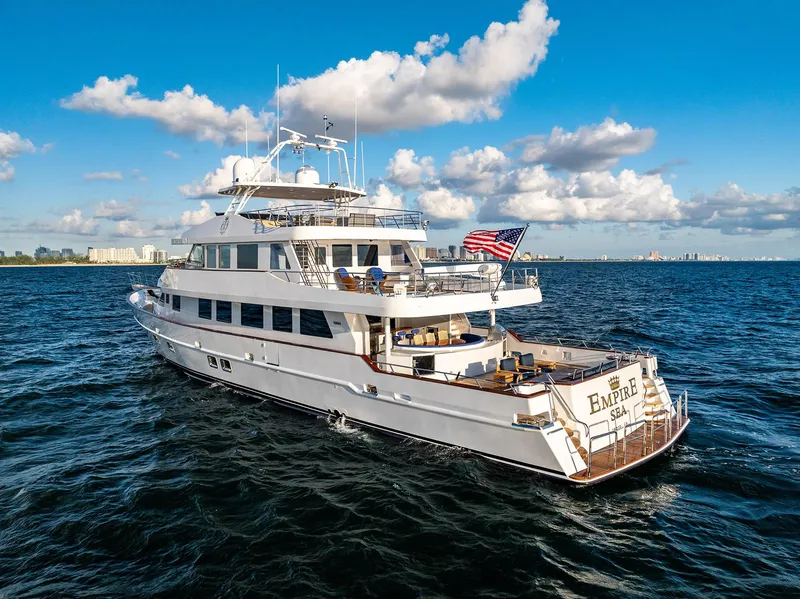 Slide: The Image of Luxurious Custom Crystal Motoryacht 2009 on open sea under sunny skies. - 9