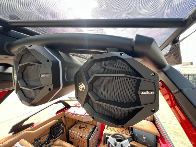 Slide: The Image of 2025 Tigé 25ZX Ultre' boat with Audison speakers, luxurious interior, and advanced audio system. - 28