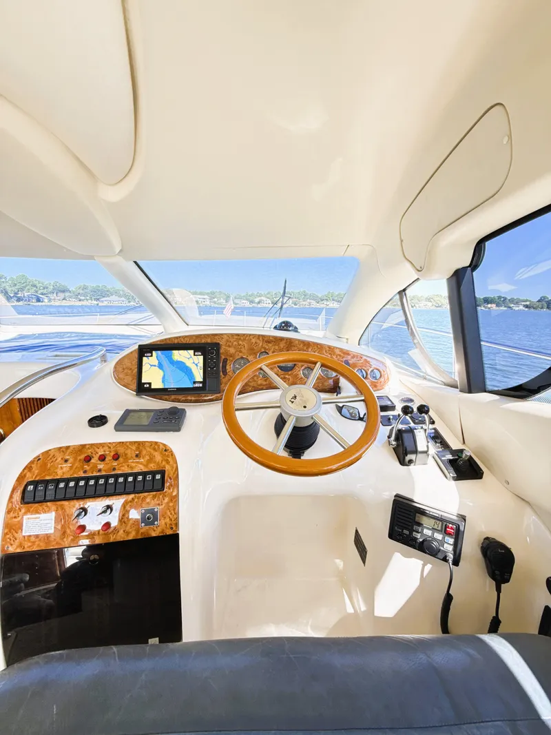 Slide: The Image of Interior view of 2002 Azimut 42 yacht cockpit with navigation equipment. - 15