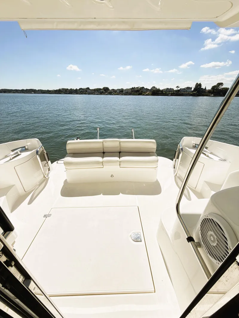 Slide: The Image of 2002 Azimut 42 yacht deck with scenic water view. - 18