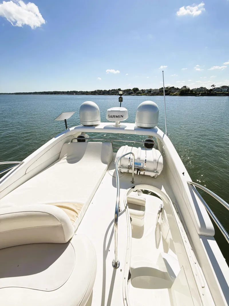 Slide: The Image of 2002 Azimut 42 yacht deck with Garmin equipment on a sunny day. - 24