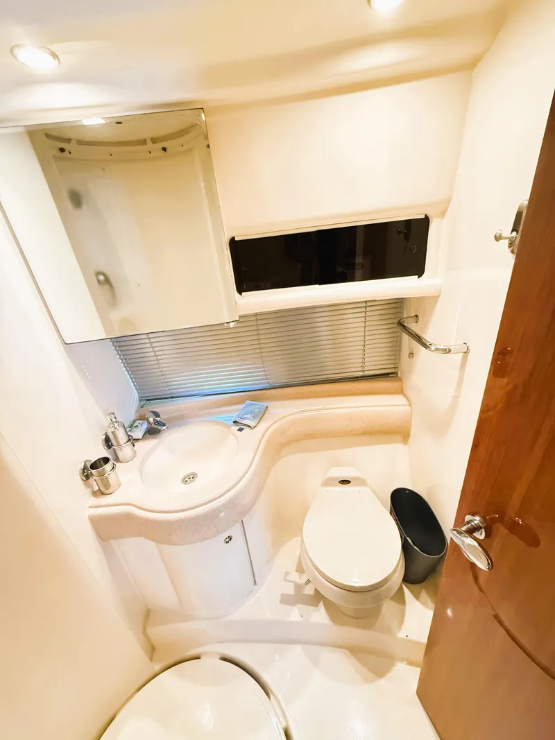 Slide: The Image of Luxurious bathroom in 2002 Azimut 42 yacht with modern fixtures and elegant design. - 31