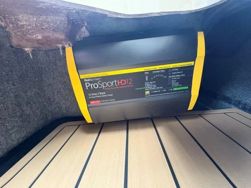 Slide: The Image of ProMariner ProSportHD12 charger in 2025 Nautique G25 boat interior. - 36