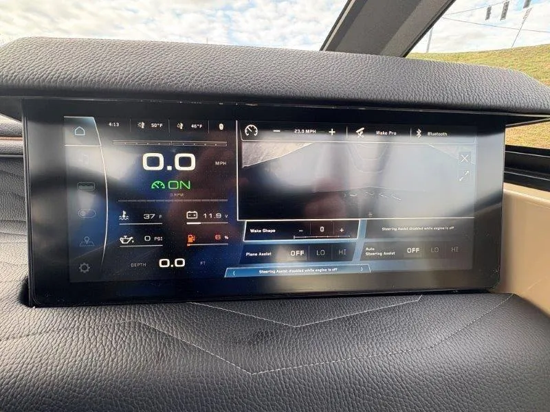 Slide: The Image of 2025 Nautique G25 dashboard display with digital controls and navigation features. - 46