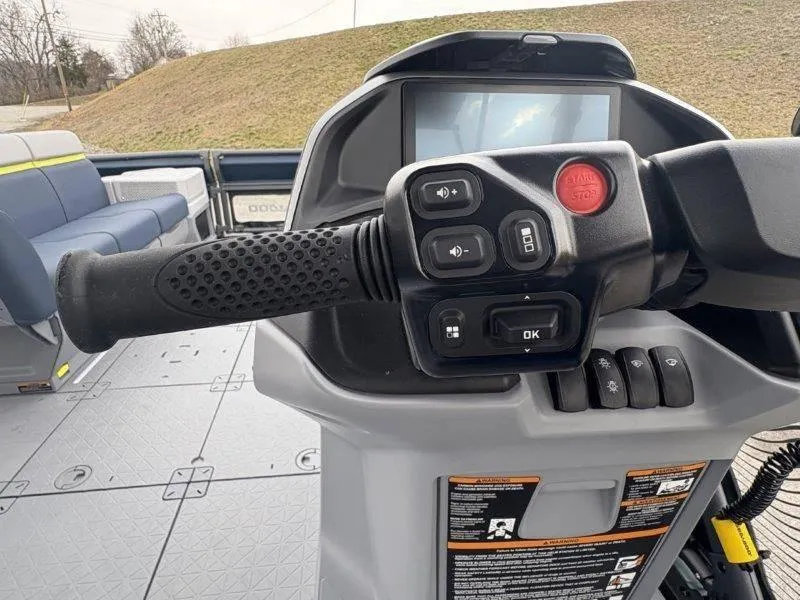 Slide: The Image of 2025 Sea-Doo Switch Cruise Limited 21' 230HP dashboard with controls and display screen. - 29