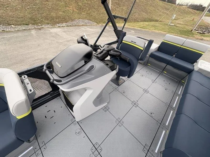 Slide: The Image of 2025 Sea-Doo Switch Cruise Limited 21' 230HP interior with modern seating and helm. - 30