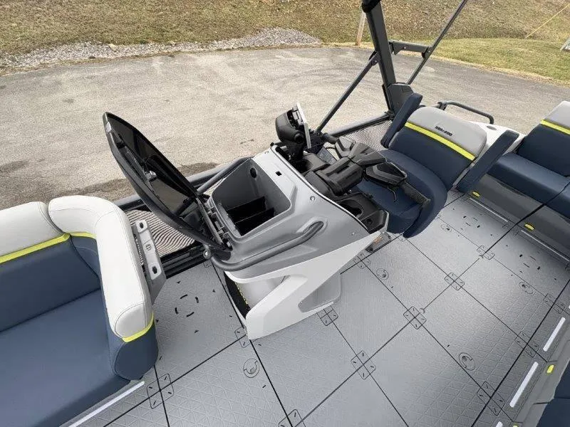 Slide: The Image of 2025 Sea-Doo Switch Cruise Limited 21' 230HP interior with open storage and seating. - 37