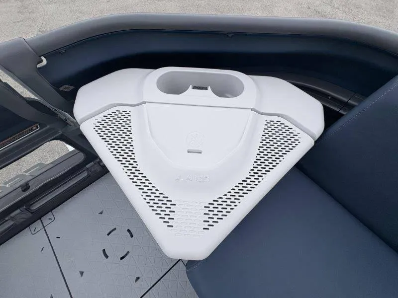 Slide: The Image of 2025 Sea-Doo Switch Cruise Limited 21' 230HP interior with cup holder and seating area. - 40