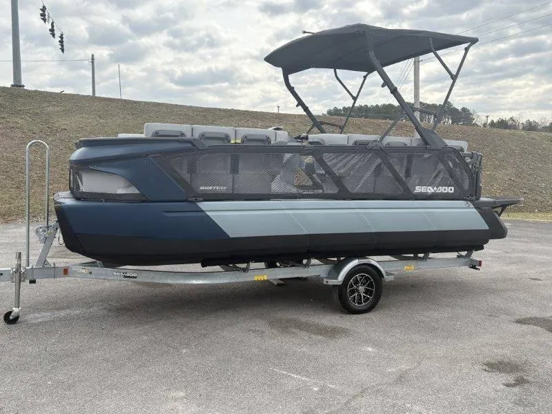 Slide: The Image of 2025 Sea-Doo Switch Cruise Limited 21' 230HP on trailer, parked outdoors. - 49