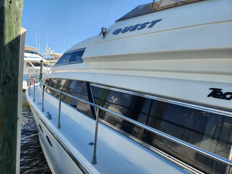 Slide: The Image of 1987 Posillipo Technema 52 yacht docked, showcasing sleek design and elegant exterior. - 10