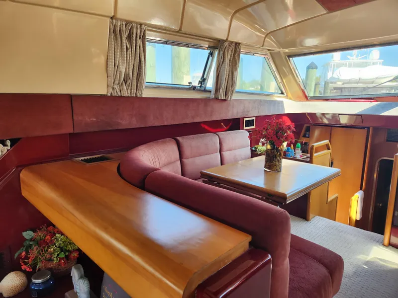 Slide: The Image of Luxurious interior of a 1987 Posillipo Technema 52 yacht with elegant seating and decor. - 27