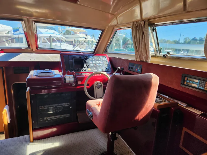 Slide: The Image of Interior of 1987 Posillipo Technema 52 yacht cockpit with steering wheel and control panel. - 28