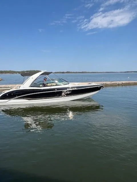 Slide: The Image of 2012 Formula 310 Bowrider I/O cruising on a sunny lake. - 10