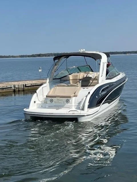 Slide: The Image of 2012 Formula 310 Bowrider I/O cruising on a calm lake. - 11
