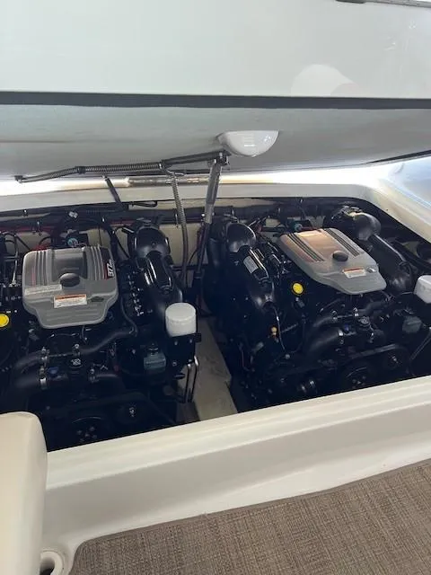 Slide: The Image of 2012 Formula 310 Bowrider I/O engine compartment with dual engines. - 15