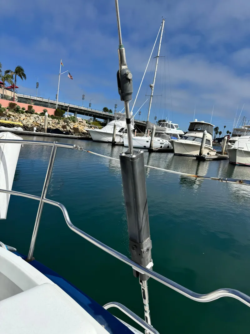 Slide: The Image of 1985 C&C 41 sailboat in harbor, close-up of bow. - 12