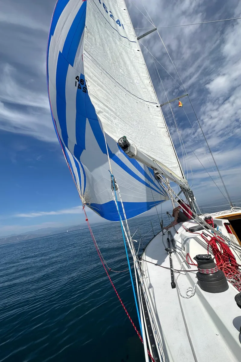 Slide: The Image of 1985 C&C 41 sailboat on calm sea. - 28