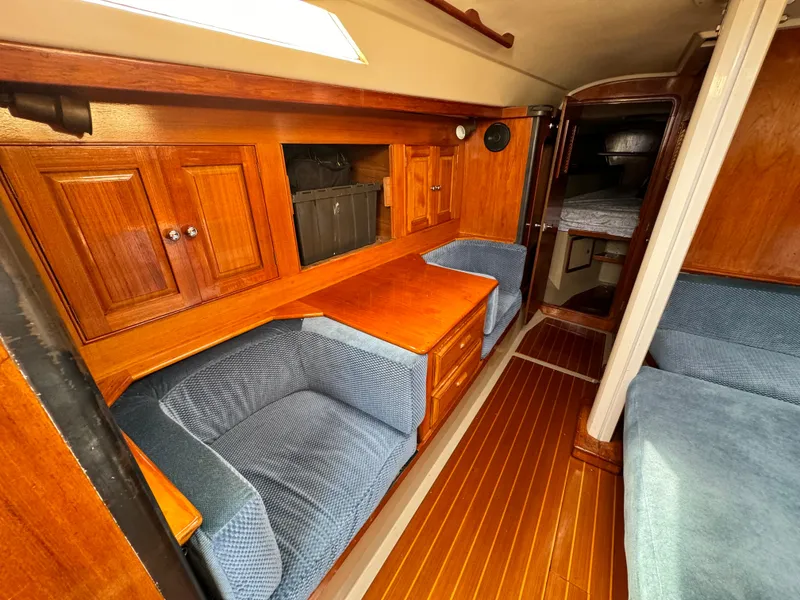 Slide: The Image of Interior of a 1985 C&C 41 yacht with wooden furnishings. - 34