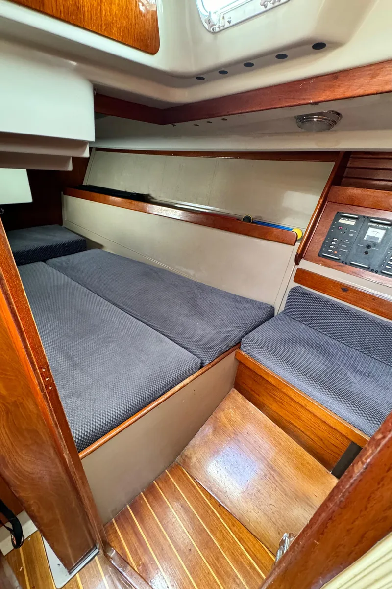 Slide: The Image of Interior of a 1985 C&C 41 yacht with wooden finish. - 41