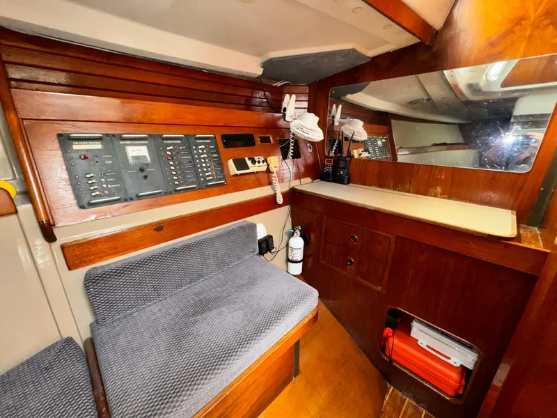 Slide: The Image of Interior of a 1985 C&C 41 yacht with wooden furnishings. - 42